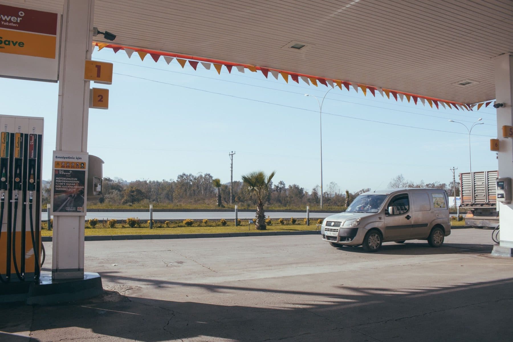 Real gas station scene for emergency fuel delivery service